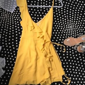 Asymmetrical Ruffle Wrap Dress from Revolve